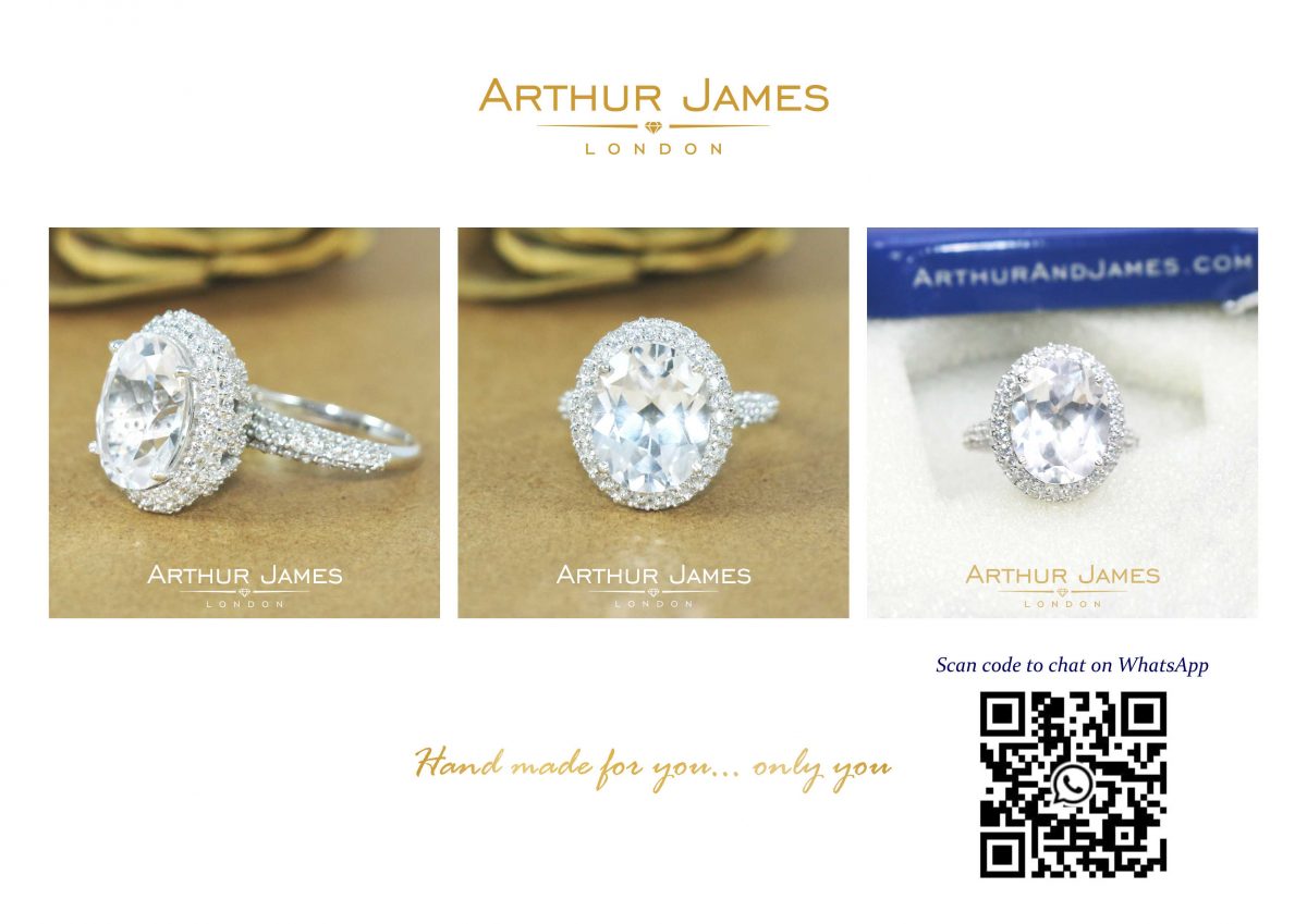 Oval Diamond Charles & Colvard Ladies Halo Ring