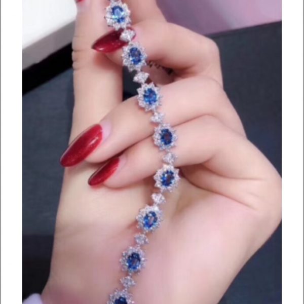 Blue Topaz Oval Cut Tennis Ladies Bracelet